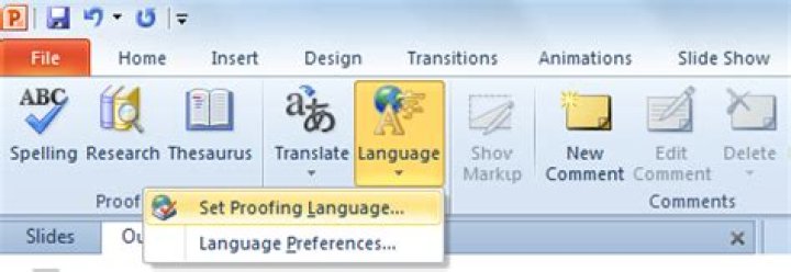 How do I change the language of all Powerpoint slides at once?