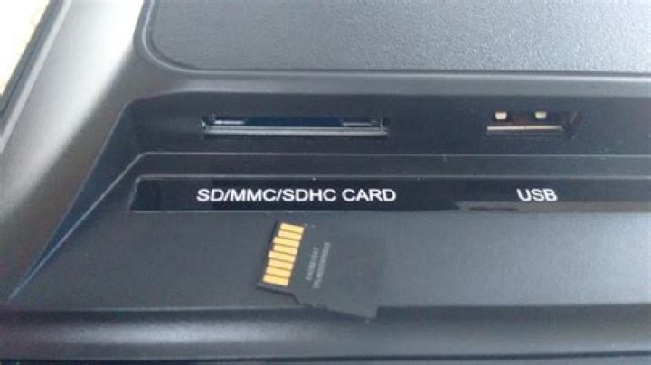 How do I put a Micro-SD card into a slot for SD/MMC/SDHC?
