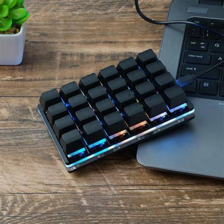 Keyboard with hardware macros? [closed]