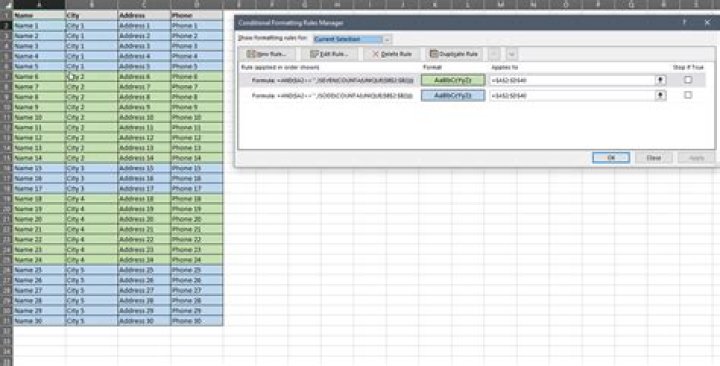 Shading groups of rows based on changing text values
