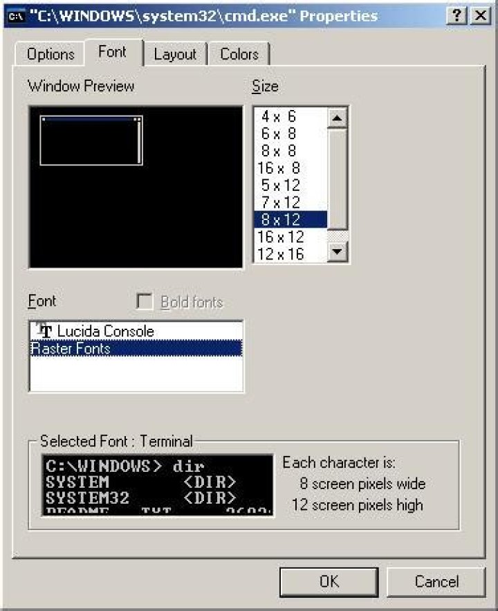 What font does CMD.exe use by default for output in Windows XP?