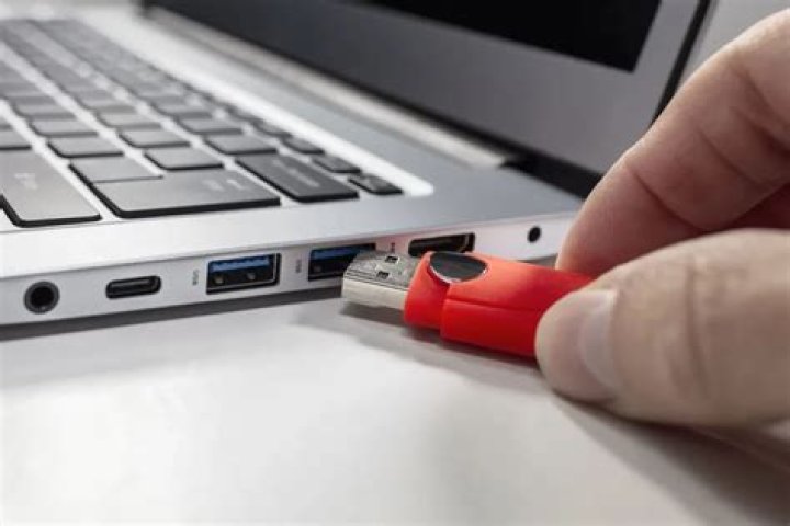 What would happen if one plugged a USB flash drive into a phone charger?